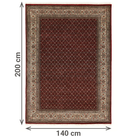 Rechteckiger Orientteppich mit tiefrotem Grundton und feinem Rautenmuster im Innenfeld. Die breite, cremefarbene Bordüre ist mit floralen Ornamenten verziert. Der Teppich zeigt klassische, symmetrische Muster in Rot, Beige, Braun und Schwarz. Die Maße sind angegeben: 200 cm Länge und 140 cm Breite.