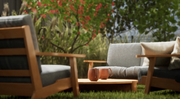 Ein tiefliegender Gartentisch zusammen mit zwei Gartensofas in Holzoptik.