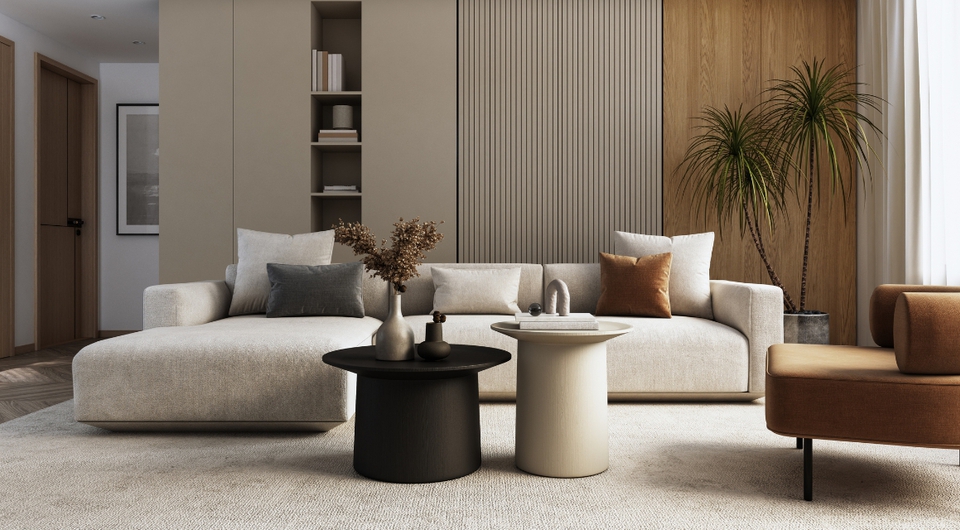 Beiges Sofa in L-Form in stylischem Wohnzimmer, das in braun und cremfarbenen Tönen gehalten ist