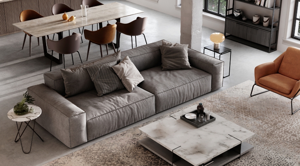 Großes, graues Sofa in einem modernen Wohnzimmer in erdigen Braun und Grautöne