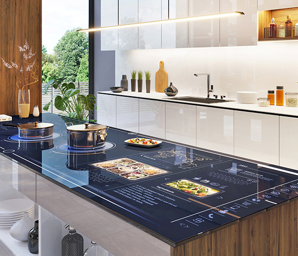 Smarte Küche mit interaktiver Arbeitsfläche, Kochfeldern und integriertem Display.