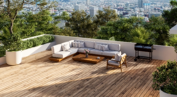 Moderne Dachterrasse mit Outdoor Sofa aus Holz und Stadtblick.