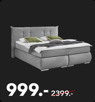 Silberfarbenes Boxspringbett aus Materialmix im modernen Stil. Jetzt statt 2.399 Euro Euro nur noch 999 Euro im Schaffrath Black Sale.