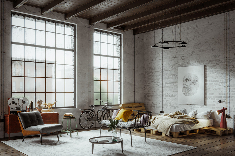 Loft-Wohnung im Industrial-Stil mit Palettenbett, Ziegelwand und rustikaler Einrichtung