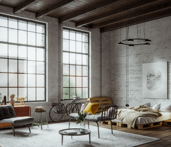 Loft-Wohnung im Industrial-Stil mit Palettenbett, Ziegelwand und rustikaler Einrichtung