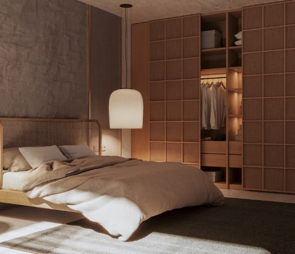 Japandi-Schlafzimmer mit Holzdetails, warmem Licht und Naturtextilien